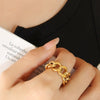 Wholesale Women's Geometric Hollow Twist Opening Electroplated Titanium Steel Ring