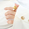 Wholesale Women's Geometric Inlaid Rubber Beads Electroplated Brass Ring With Retro Flower Design