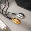 Wholesale Women's Geometric Irregularshaped Gold Plated Stainless Steel And Titanium Steel Pendant Leather Cord Necklace