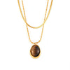 Wholesale Women's Geometric Oval Inlaid Tiger Eye Pendant Necklace With 18K Gold Plated Titanium Steel