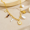 Wholesale Women's Geometric Pearl Tiger Eye Stone Pendant Flower Heart Stainless Steel Electroplated Accessories Set With Plants And Flowers Pattern
