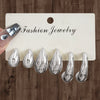 Wholesale Women's Geometric Plastic And Resin Water Drop And Cshaped Earrings With Electroplating Treatment