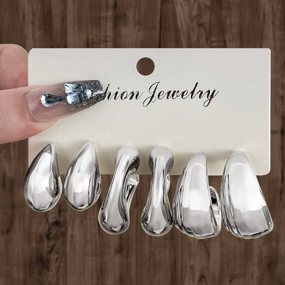 Wholesale Women's Geometric Plastic And Resin Water Drop And Cshaped Earrings With Electroplating Treatment