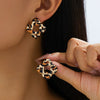 Wholesale Women's Geometric Square And Flower Shaped Alloy Electroplated Earrings With Exaggerated Niche Design