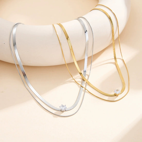 Wholesale Women's Geometric Stainless Steel And Titanium Steel Electroplated Calendering Doublelayered Snake Bone Chain Necklace Jewelry