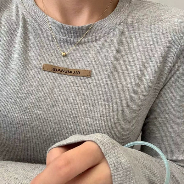 Wholesale Women's Geometric Stainless Steel And Titanium Steel Electroplated Love Pendant Necklace With Cross Chain In Ins Style