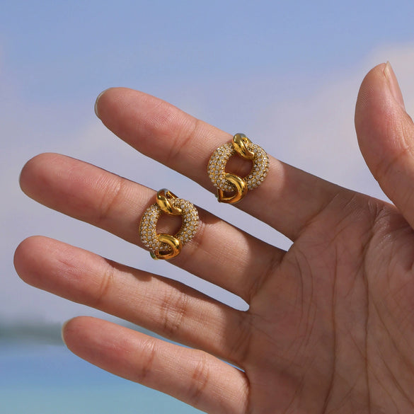 Wholesale Women's Geometric Stainless Steel And Zircon Electroplated Ferris Wheel Twist Knot Side Opening Ring