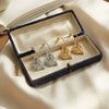 Wholesale Women's Geometric Stainless Steel Goldplated Asymmetrical Heart Pendant Earrings