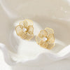 Wholesale Women's Geometric Stainless Steel 18K Gold Electroplated Threedimensional Hollow Flower Stud Earrings