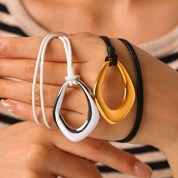 Wholesale Women's Geometric Stainless Steel Necklace With Real Gold Plating In The Furnace And Black Rope Chain