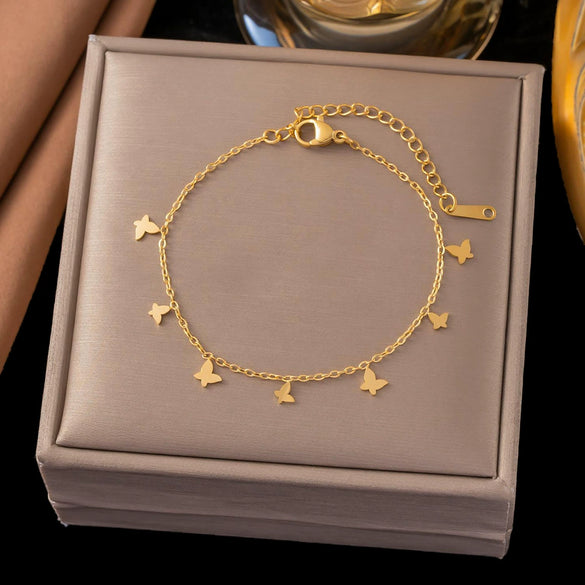 Wholesale Women's Geometric Stainless Steel Real Gold Plated Bracelet With Four Leaf Clover Pendant
