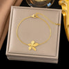 Wholesale Women's Geometric Stainless Steel Real Gold Plated Bracelet With Four Leaf Clover Pendant
