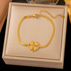 Wholesale Women's Geometric Stainless Steel Real Gold Plated Bracelet With Four Leaf Clover Pendant