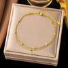 Wholesale Women's Geometric Stainless Steel Real Gold Plated Bracelet With Four Leaf Clover Pendant