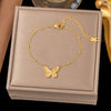 Wholesale Women's Geometric Stainless Steel Real Gold Plated Bracelet With Four Leaf Clover Pendant