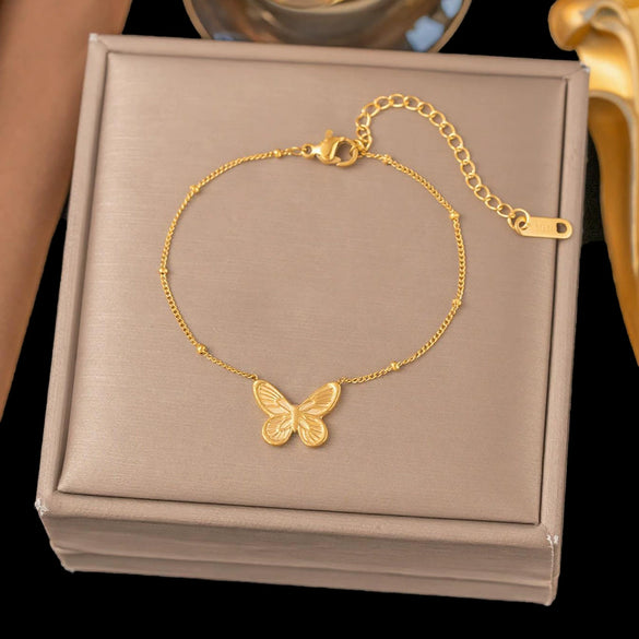 Wholesale Women's Geometric Stainless Steel Real Gold Plated Bracelet With Four Leaf Clover Pendant