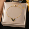 Wholesale Women's Geometric Stainless Steel Real Gold Plated Bracelet With Four Leaf Clover Pendant
