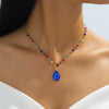 Wholesale Women's Glass Bead Chain Water Drop Pendant Necklace With Flower Pattern Alloy Zinc Electroplated