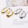 Wholesale Women's Gold Inlaid Ushaped Titanium Steel Hollow Earrings