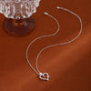 Wholesale Women's Gold Plated Copper Heart Shaped Clavicle Chain Necklace With Cross Inlay And Electroplating Treatment