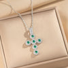 Wholesale Women's Gold Plated Geometric Cross Necklace With Green Zircon Inlay In Copper And Titanium Steel