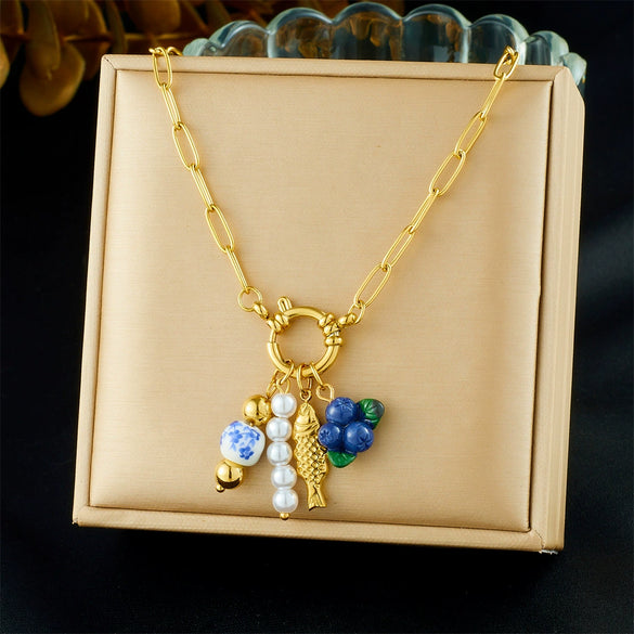 Wholesale Women's Goldplated Stainless Steel Heart Shape And Flower Pattern Hollow Pendant Necklace With Cross Chain