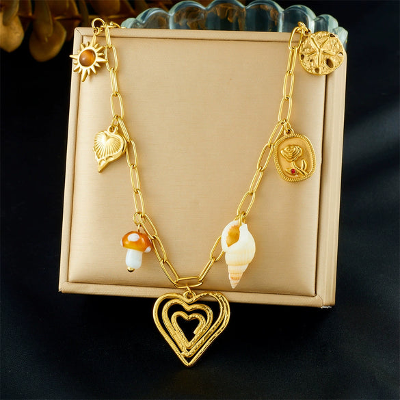 Wholesale Women's Goldplated Stainless Steel Heart Shape And Flower Pattern Hollow Pendant Necklace With Cross Chain