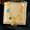 Wholesale Women's Goldplated Stainless Steel Heart Shape And Flower Pattern Hollow Pendant Necklace With Cross Chain