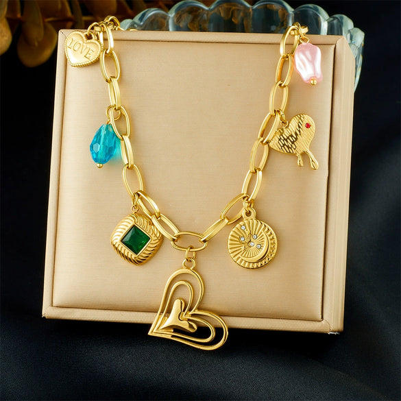 Wholesale Women's Goldplated Stainless Steel Heart Shape And Flower Pattern Hollow Pendant Necklace With Cross Chain