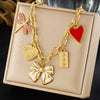 Wholesale Women's Goldplated Stainless Steel Insect Heart Shape Bow Pendant Necklace With Flash O Chain