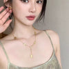 Wholesale Women's Goldplated Titanium Steel Yshape Arc De Triomphe Tassel Necklace With Ochain