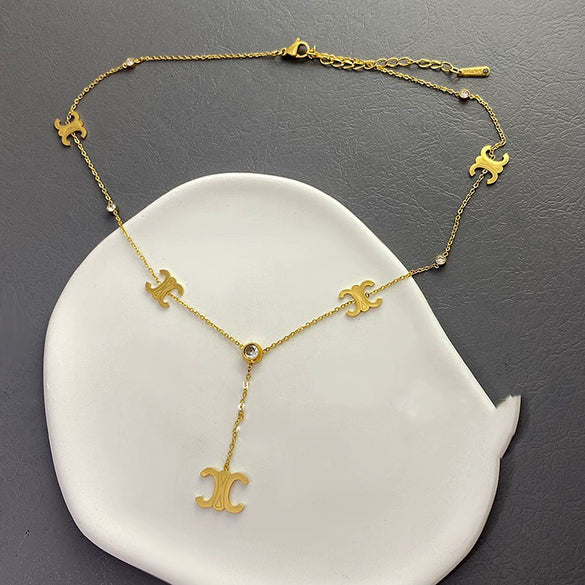 Wholesale Women's Goldplated Titanium Steel Yshape Arc De Triomphe Tassel Necklace With Ochain