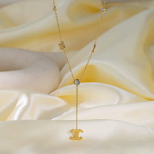 Wholesale Women's Goldplated Titanium Steel Yshape Arc De Triomphe Tassel Necklace With Ochain