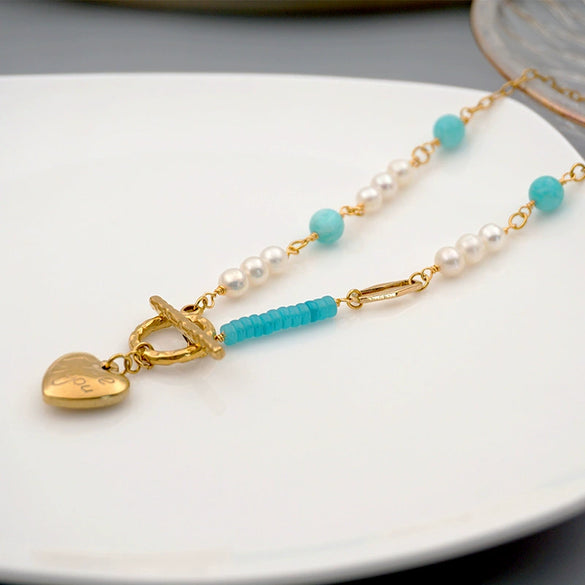 Wholesale Women's Handmade Freshwater Pearl And Titanium Steel Heartshaped Necklace And Sweater Chain