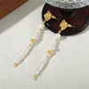 Wholesale Women's Handmade Geometric Natural Freshwater Pearl And Copper Earrings In Palace Style