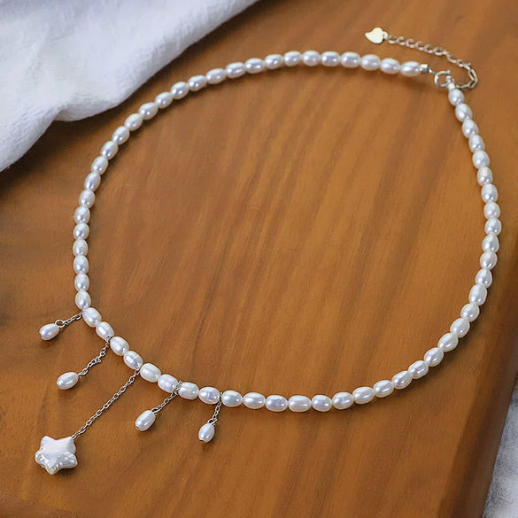 Wholesale Women's Handmade Natural Freshwater Pearl Geometric Vintage Baroque Fairy Style Necklace With Star Pendant And Tassel