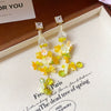 Wholesale Women's Handmade Plastic And Resin Flowershaped Tassel Earrings Little Fresh Style