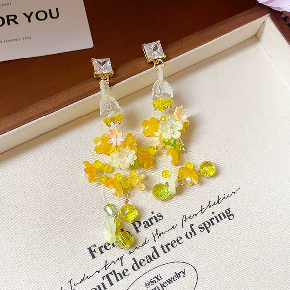 Wholesale Women's Handmade Plastic And Resin Flowershaped Tassel Earrings Little Fresh Style