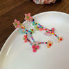 Wholesale Women's Handmade Plastic And Resin Flowershaped Tassel Earrings Little Fresh Style