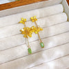 Wholesale Women's Handmade Plastic And Resin Flowershaped Tassel Earrings Little Fresh Style