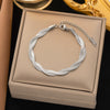Wholesale Women's Handwoven Electroplated Titanium Steel Threelayer Cross Clavicle Necklace With Snake Bone Chain