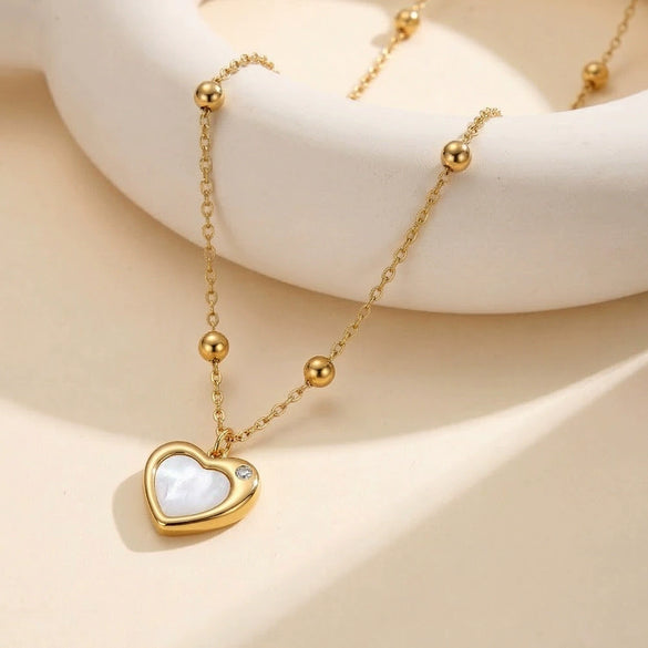 Wholesale Women's Heartshaped Geometric Pearl Shell Titanium Steel 18K Goldplated Calendering Chain Necklace