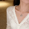 Wholesale Women's Heartshaped Zirconinlaid Titanium Steel Necklace With Water Wave Chain Light Luxury Design