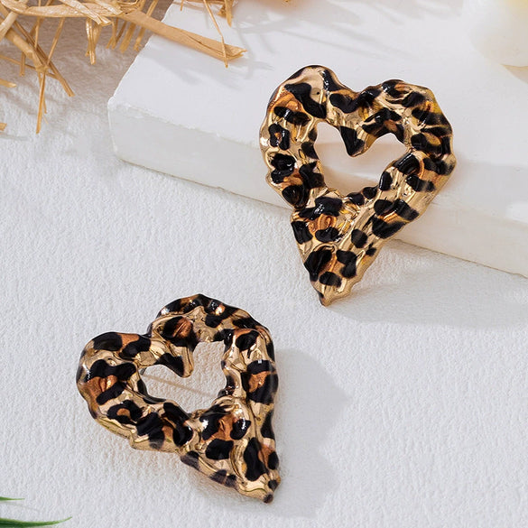 Wholesale Women's Hollow Heart And Flower Pattern Leopard Print Alloy Electroplated Earrings Accessories