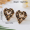 Wholesale Women's Hollow Heart And Flower Pattern Leopard Print Alloy Electroplated Earrings Accessories