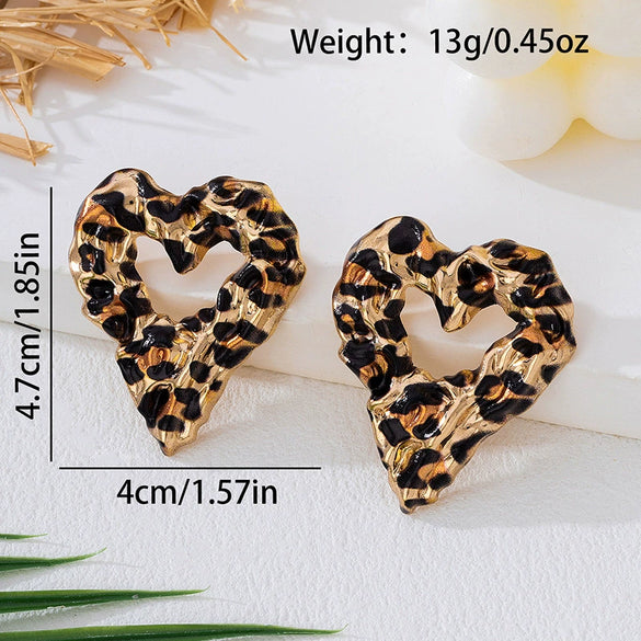 Wholesale Women's Hollow Heart And Flower Pattern Leopard Print Alloy Electroplated Earrings Accessories