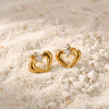 Wholesale Women's Hollow Heartshaped Double Zirconia Stud Earrings With 18K Gold Texture Stainless Steel Electroplated Niche Style