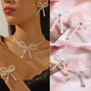 Wholesale Women's Imitation Pearl Beaded Bow Earrings Simple Style