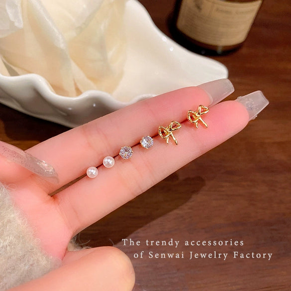 Wholesale Women's Imitation Pearl Bow Tie Earrings With Electroplating
