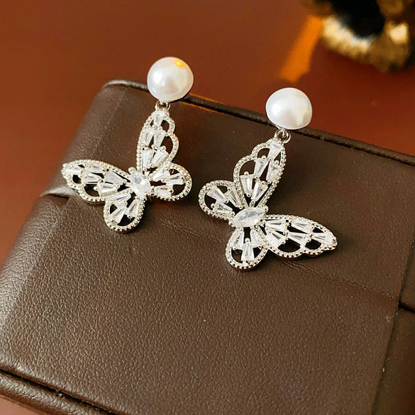 Wholesale Women's Imitation Pearl Geometric Style Electroplated Earrings